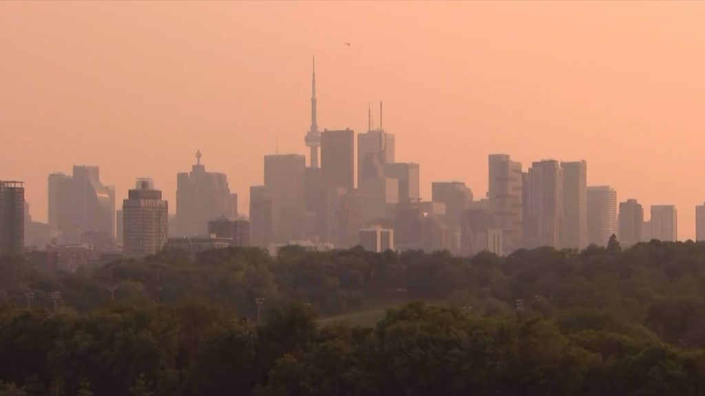“Toronto Blanketed in Wildfire Smoke: Urgent Air Quality Warning Issued!”